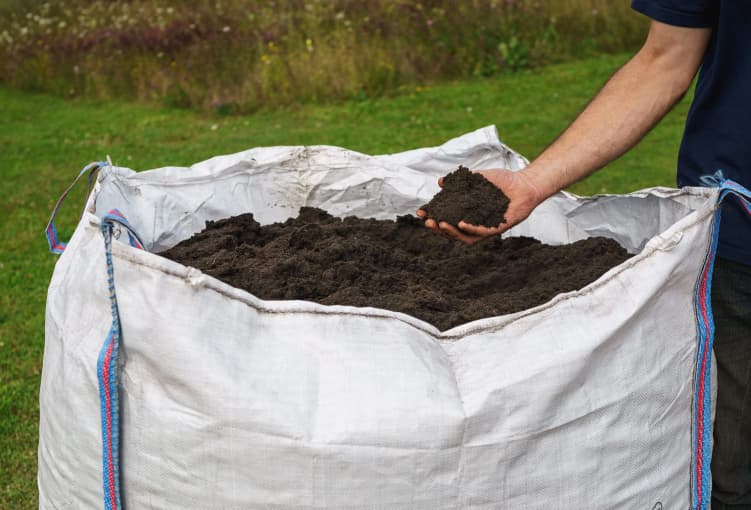 wildflower turf soil product being held in the hand